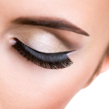 closeup-female-eye-with-beautiful-fashion-makeup-with-long-false-eyelashes